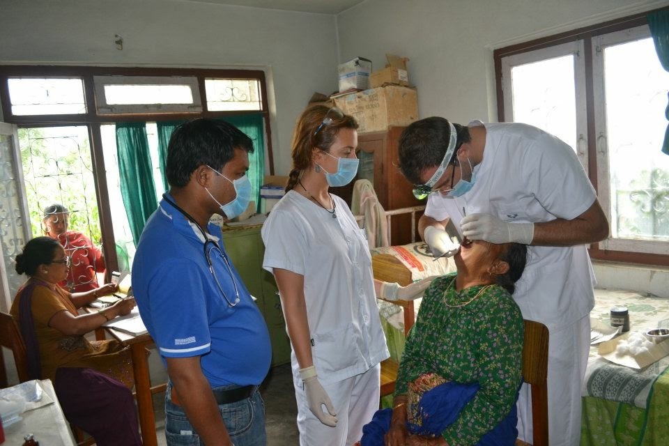 Medical students check patients